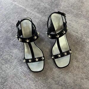 Authentic CHANEL Black Sandals with Star Accents